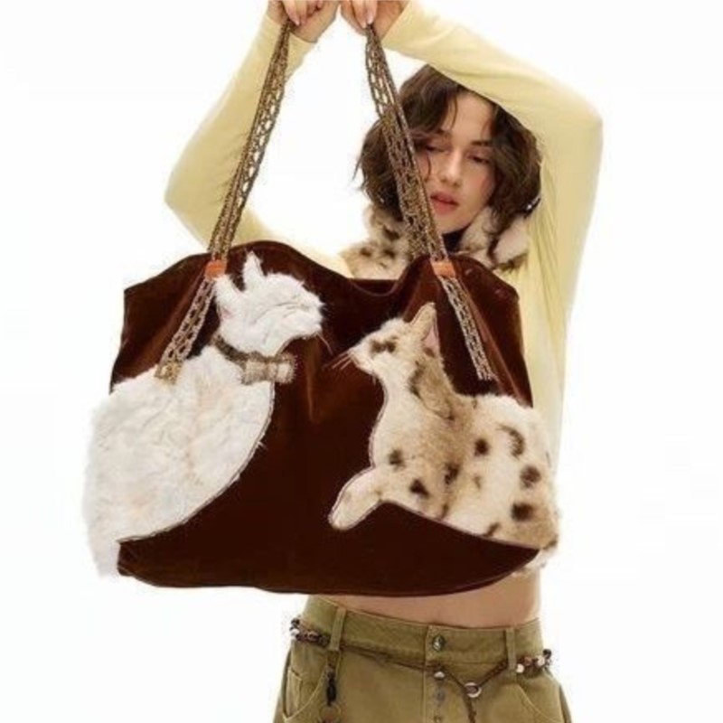 Borsa tote retrò dolce e carin - Half Moon Bag Suede recensione e prezzo